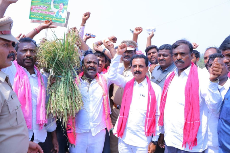 TRS PROTEST 2 TRS leaders, workers block National Highways over paddy procurement