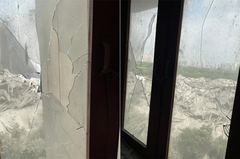 WINDOW PANES AND CRACKS 1 Twin Towers demolition: Window panes broken, cracks appear in neighbouring flats; See Pics