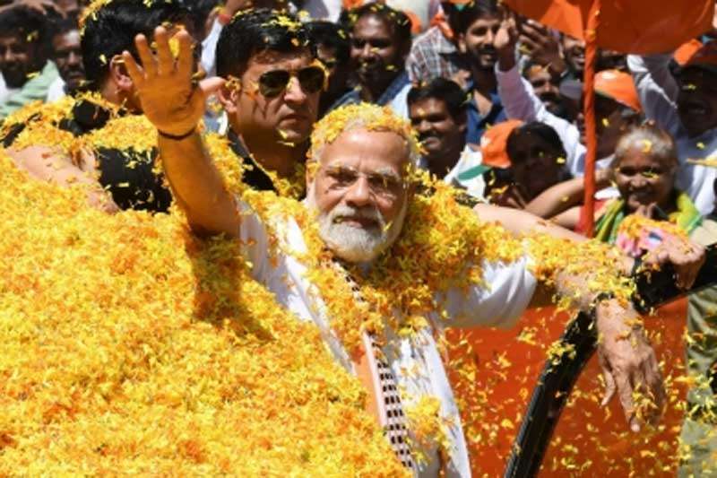 modi 1 1 BJP hopes 'Modi magic' will work in Karnataka as it did in Gujarat