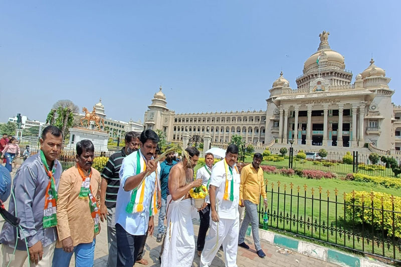 VIDHAN SOUDHA Congress workers purify Karnataka Vidhana Soudha with cow urine