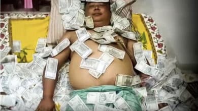 Assam Politician's Viral Photo on Bed of Notes Sparks Controversy, Party Distances Itself