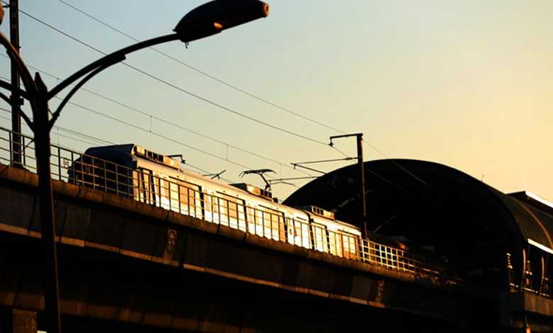 Man standing atop truck dies after his head hits metro station beam