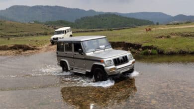 Vehicle carrying EVM sinks in Assam River