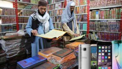 Phones, Islamic books and currency exchange. Some businesses are making money out of Taliban rule