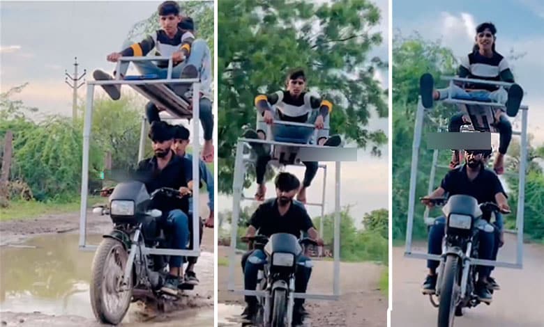 Risky Ride: Youths Perform Dangerous Stunts on Iron Hoop Bike!