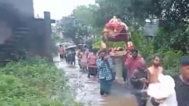 Local Residents Struggle to Transport Goods Amidst Poor Roads and Floods