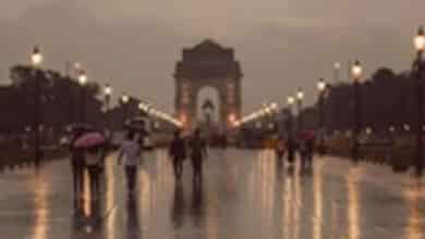 Delhi Wakes Up to Light Rain Amid Poor Air Quality; IMD Predicts More Showers