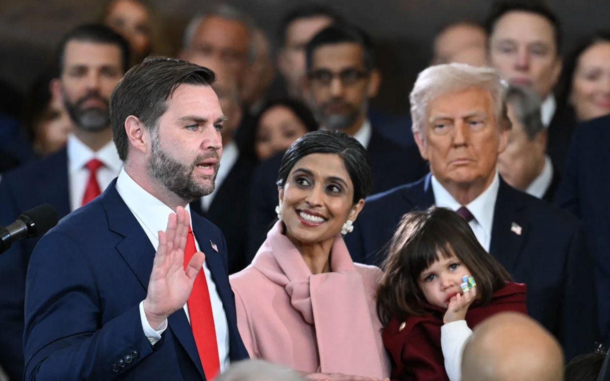 Usha Vance holds the Bible as J.D. Vance takes the oath of office as Vice President of the United States.