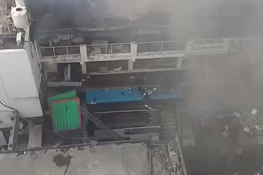 Firefighters douse flames at Devan Devdi market in Hyderabad’s Pathergatti area following a major blaze. Over 10 fire engines were deployed to control the incident.