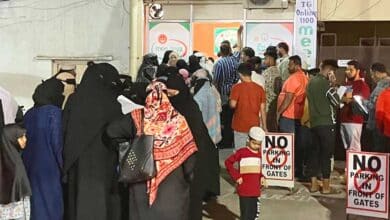 Residents submit ration card applications at a MeeSeva center in Telangana.