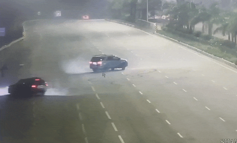 Youth Engaged in Car Racing and Stunts on Outer Ring Road