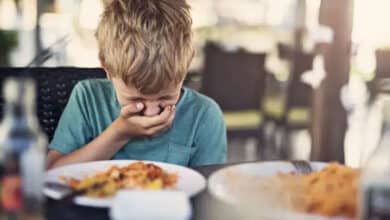 A pediatrician advises a parent on managing food poisoning symptoms in Hyderabad.