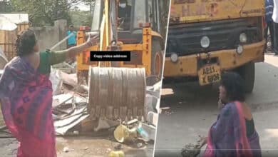 Outrage in Uppal: Woman's Shocking Protest Against GHMC Booth Demolition!