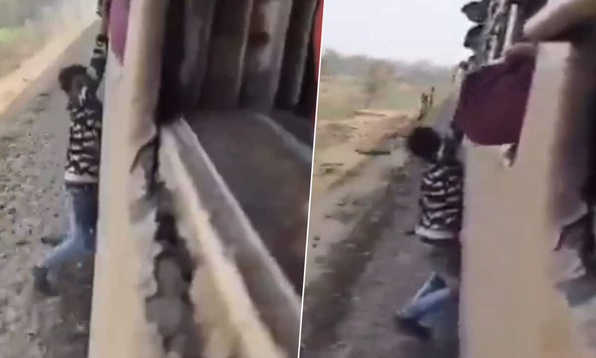 Man Hangs from Train Window for a Minute for Reel, Passengers Save His Life – Shocking Video!