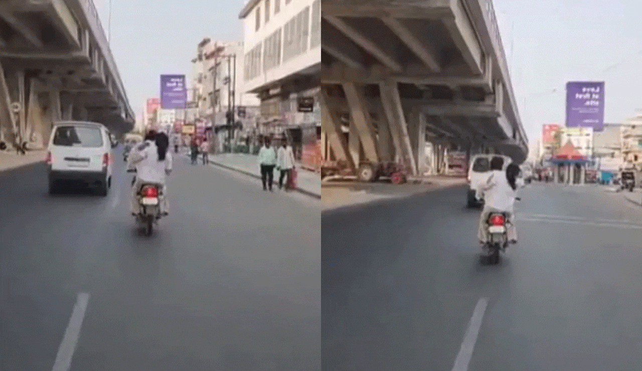 Viral Video: Woman Beats Husband with Slipper on Moving Bike – His Reaction Will Shock You!