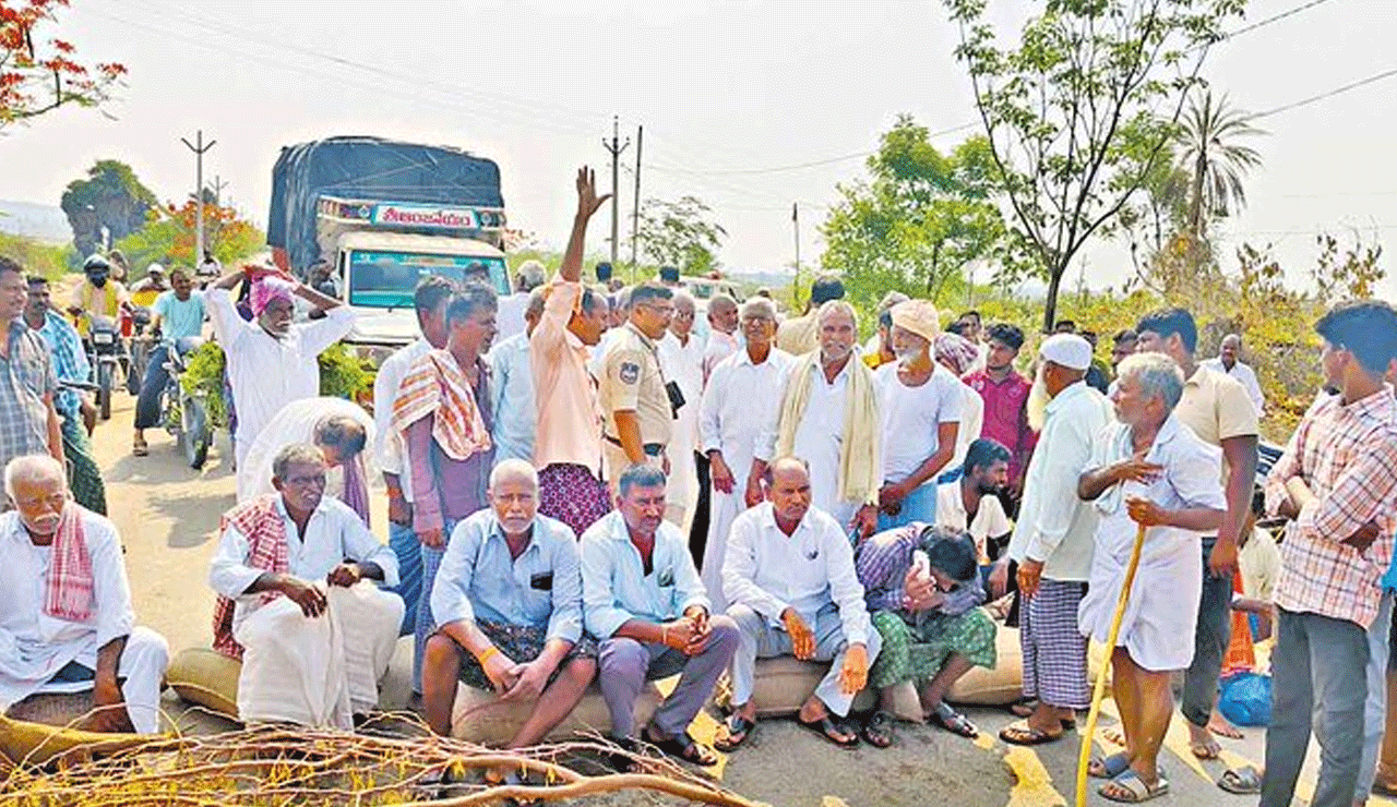 Farmers Take to Streets in Armoor, Stage Protest Demanding Purchase of Soaked Paddy