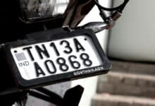 HSRP plates feature laser-etched codes, Ashok Chakra holograms, and snap-lock rivets for tamper-proof security.