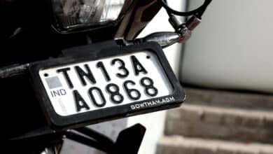 HSRP plates feature laser-etched codes, Ashok Chakra holograms, and snap-lock rivets for tamper-proof security.
