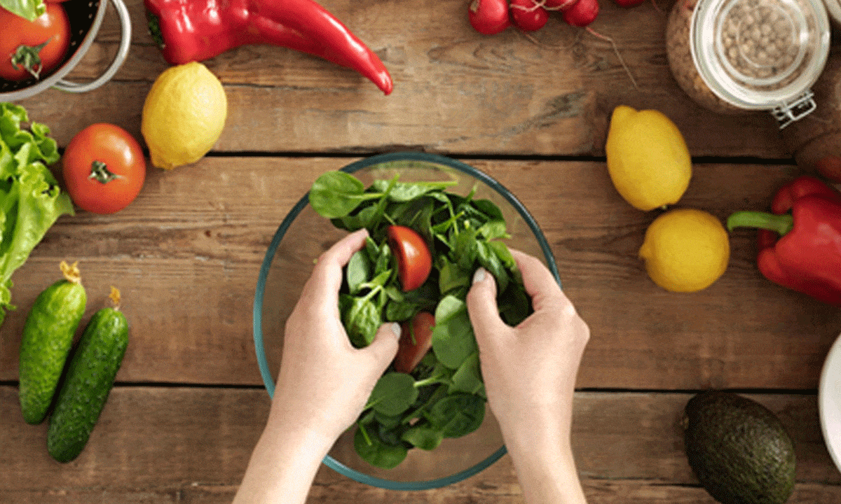 A bowl of spinach, kale and broccoli may boost heart health in elderly women