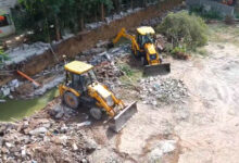 HYDRAA Demolition Drive in Kukatpally: Nala Encroachments Razed to Prevent Flooding